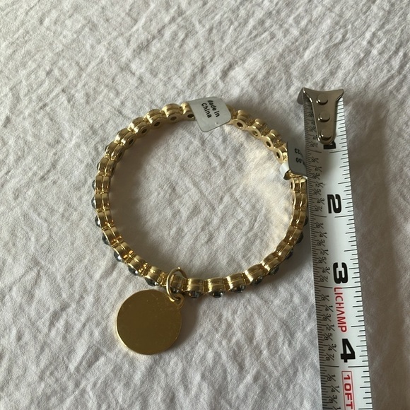 Gold tone slip on faux gem bracelet with gold charm - Picture 16 of 16